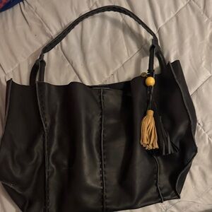 The Sak Black Tote with Tan Tassel